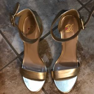 Never worn gold heels